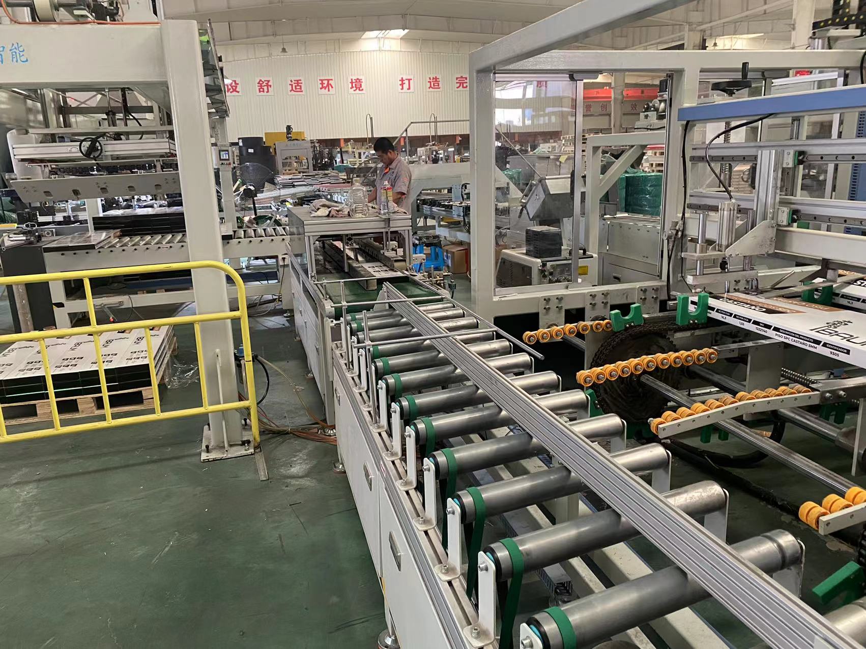 Automated SPC flooring packaging production line